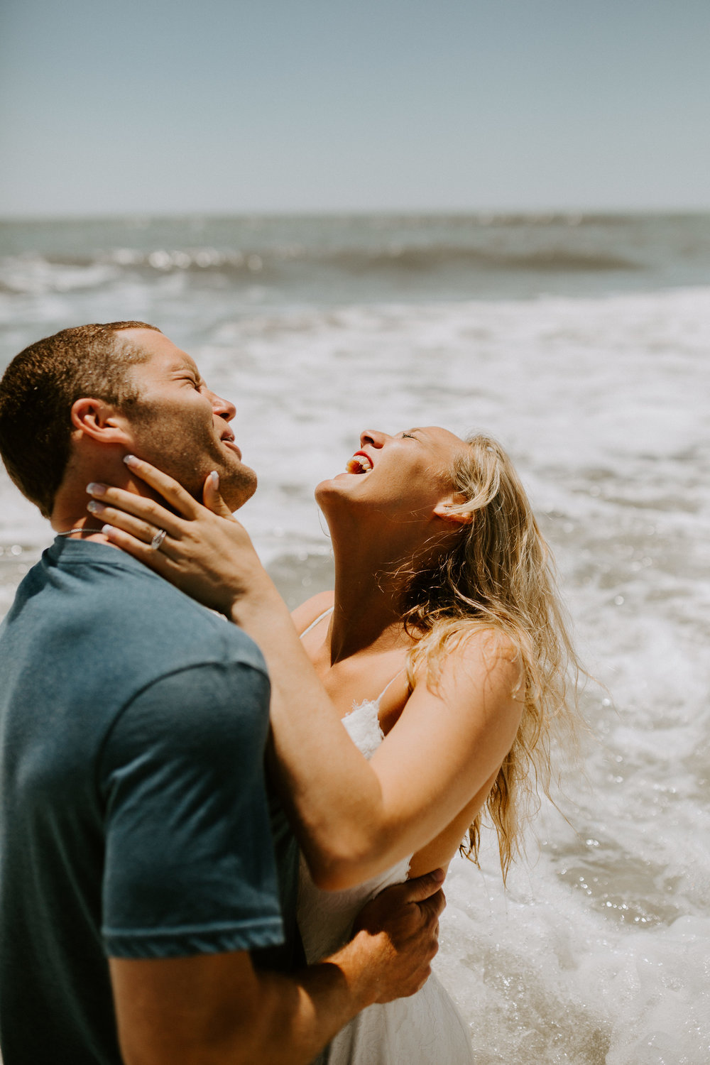 couple laughing in water