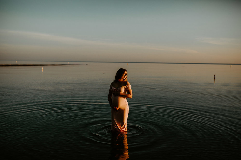 water maternity photos at hunting beach in cleveland